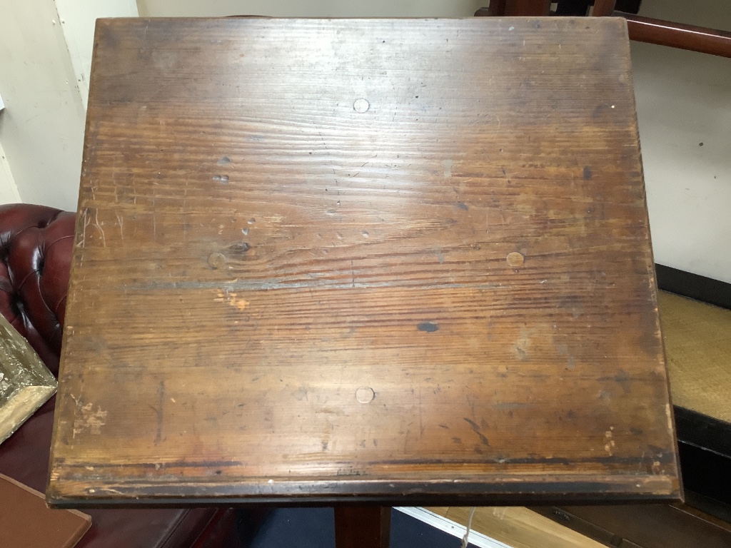 A Victorian pine Gothic style lectern, width 50cm height 139cm